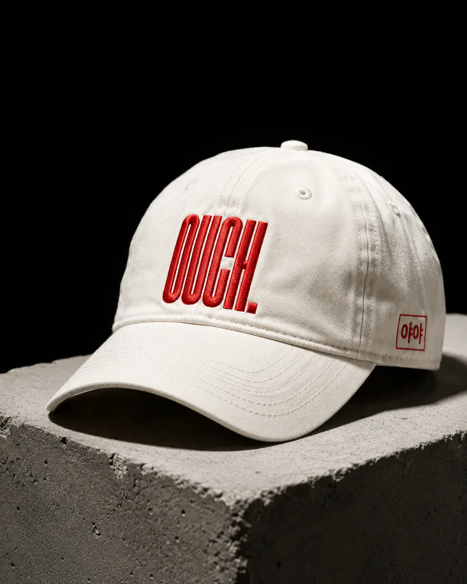 OUCH. Cap in Off-White mit rot gesticktem Logo